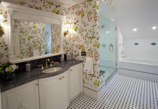 Colorful wallpaper and a unique countertop bring color to this traditional bathroom design in Newtown, PA