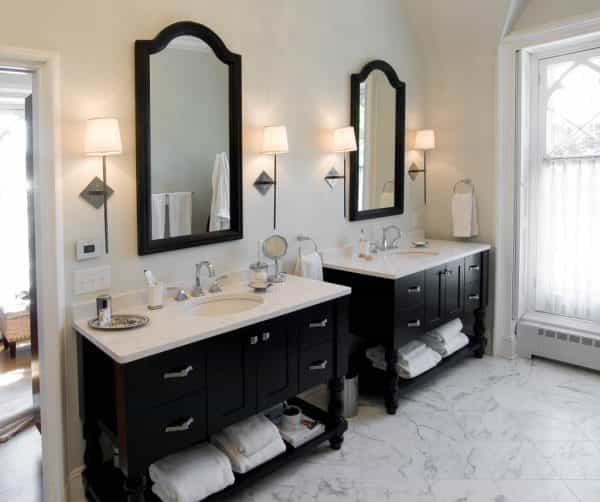 Black cabinetry and white marble provides a classic look in this Princeton NJ bathroom design